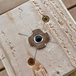 Tee nuts for leg levelers